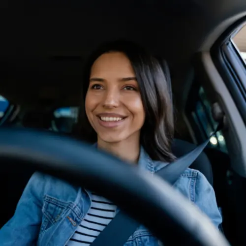 Woman happy in car